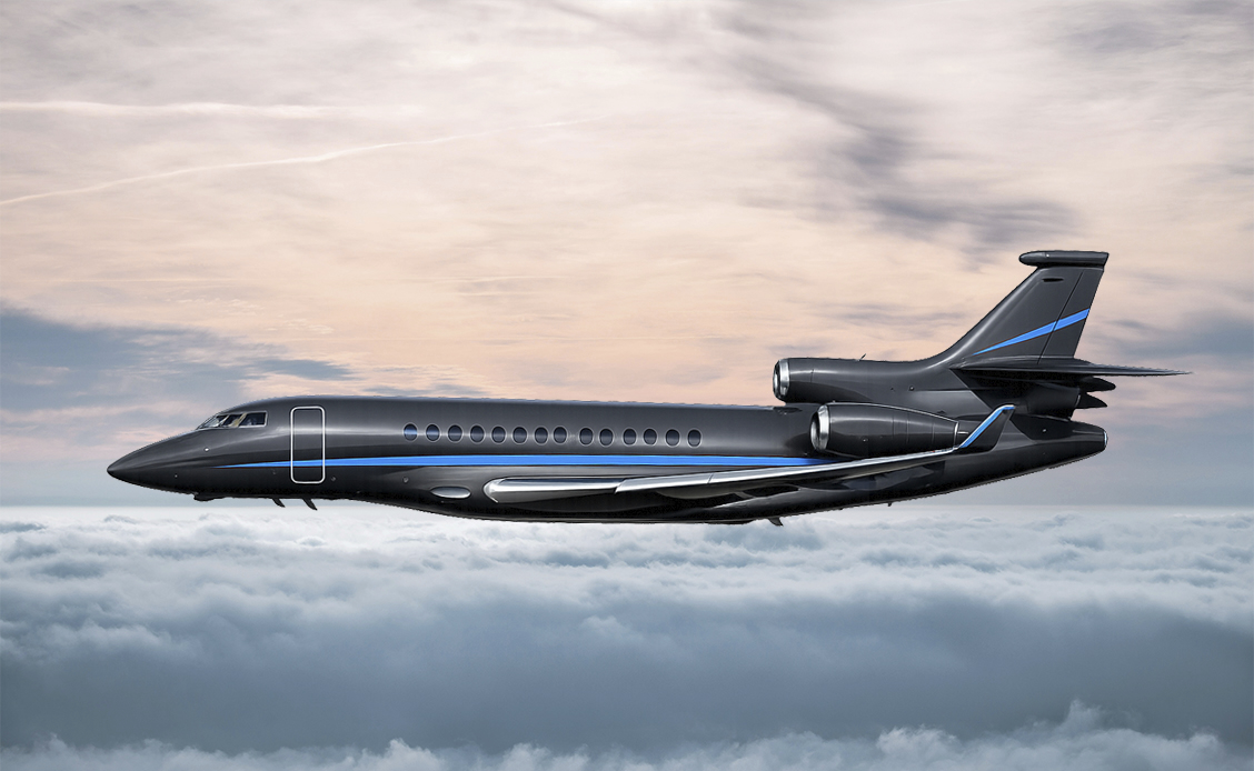 Dassault Falcon 8X at Sunset | Lohn Aviation Dassault Falcon 8X private jet flying above the clouds at sunset