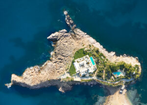 Overhead aerial view of the private island Isla Sa Ferradura, Ibiza